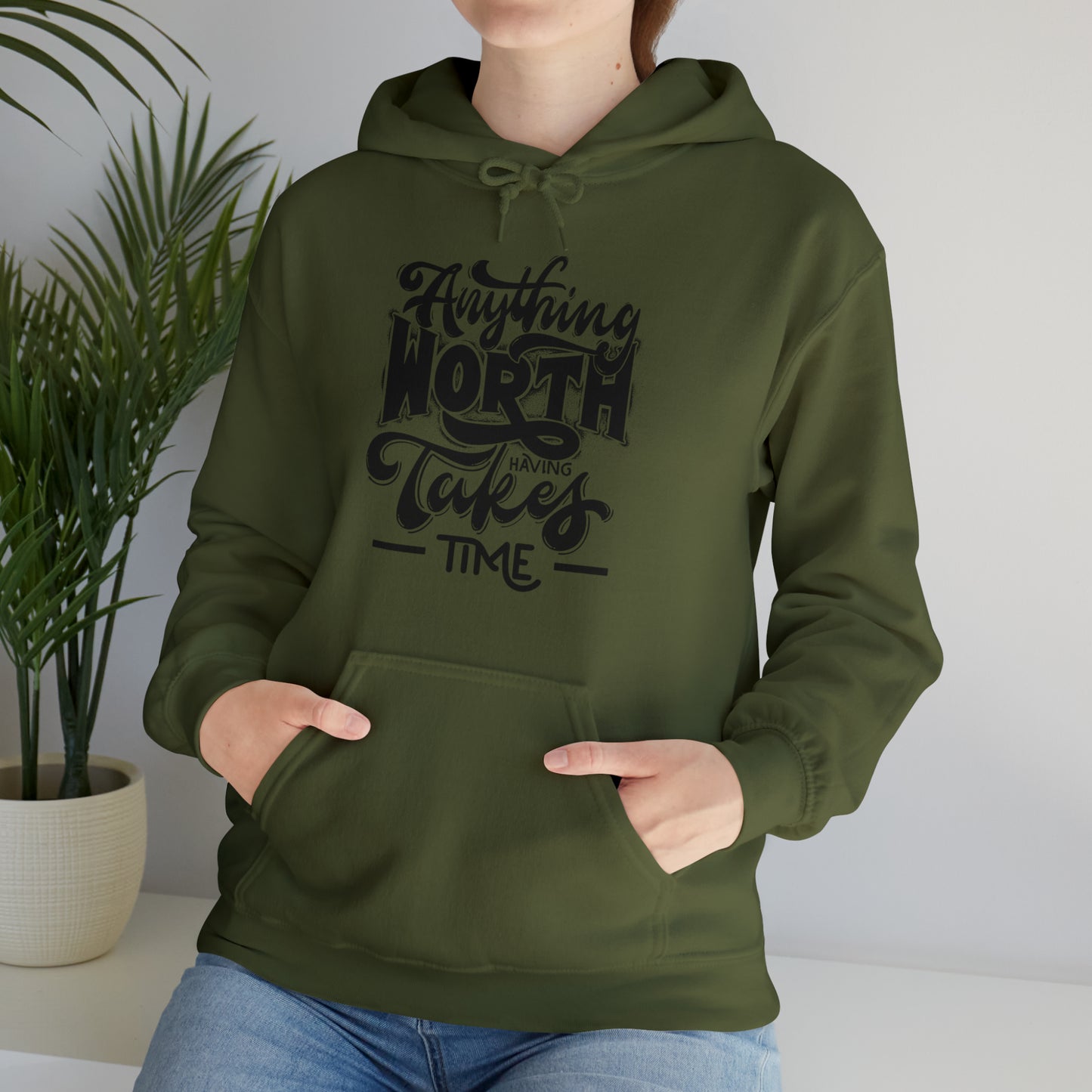 Anything Worth Heavy Blend™ Hooded Sweatshirt