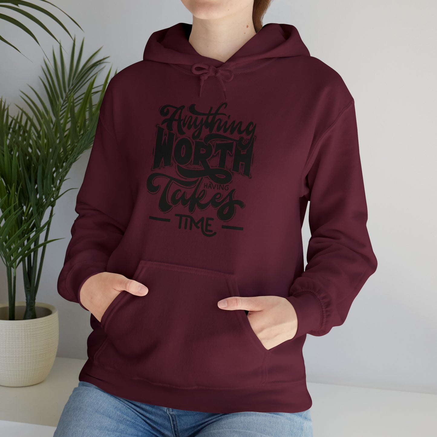 Anything Worth Heavy Blend™ Hooded Sweatshirt