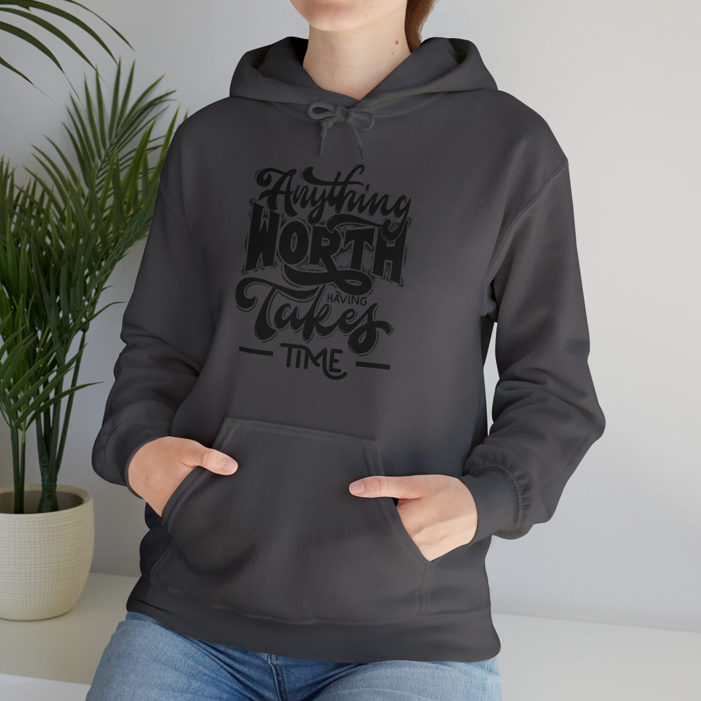 Anything Worth Heavy Blend™ Hooded Sweatshirt