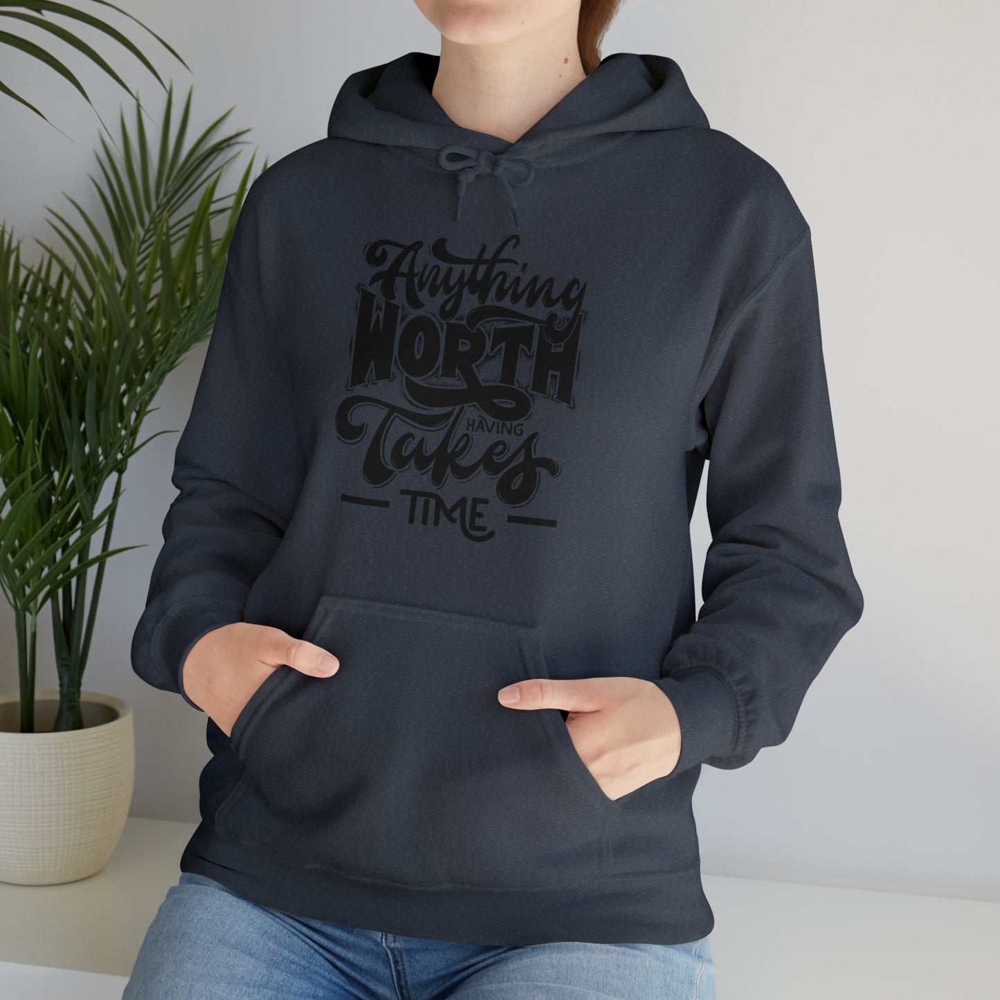 Anything Worth Heavy Blend™ Hooded Sweatshirt