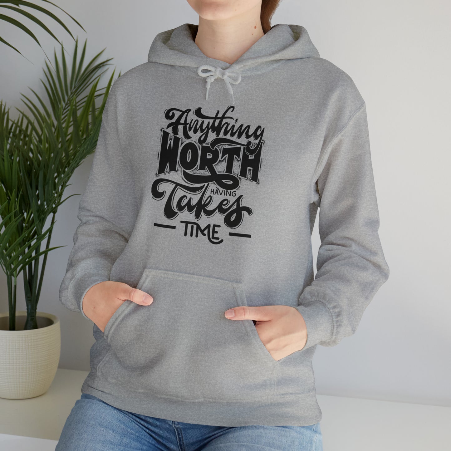 Anything Worth Heavy Blend™ Hooded Sweatshirt