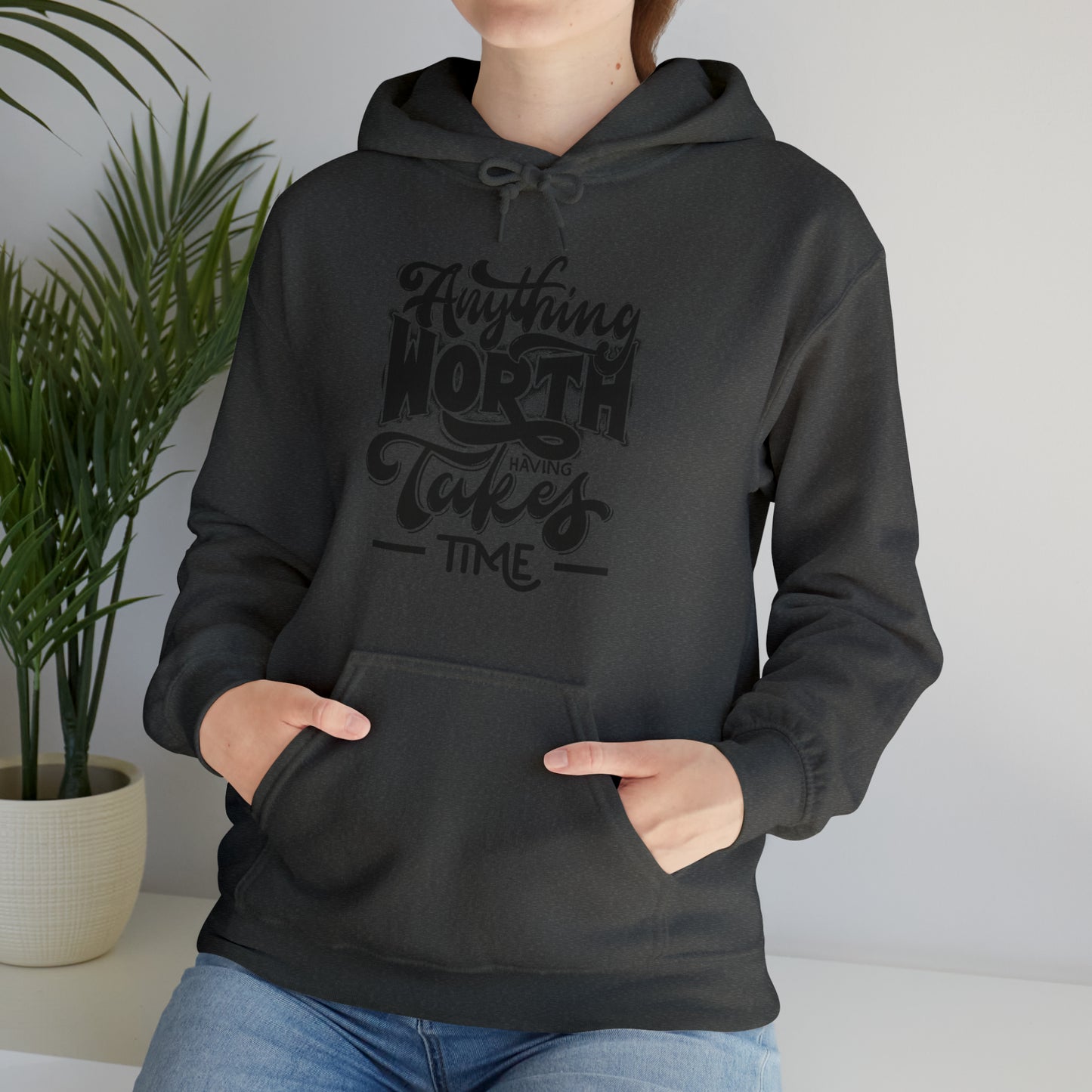 Anything Worth Heavy Blend™ Hooded Sweatshirt