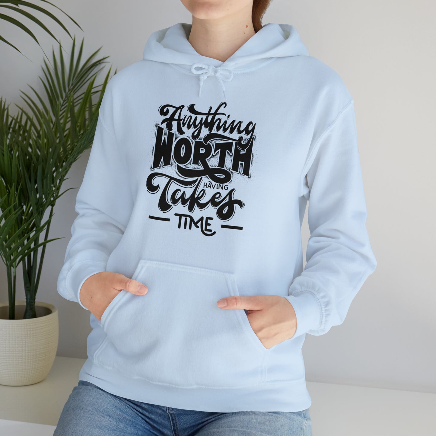 Anything Worth Heavy Blend™ Hooded Sweatshirt